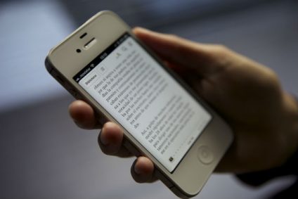 Com o potencial público de leitura-no-smartphone, jornais e revistas passam a lançar aplicativos próprios para otimizar o acesso do usuário ao conteúdo. (Foto: Online Nigeria)